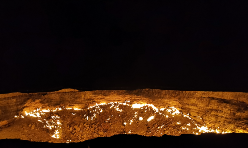 The Darvaza Gas Crater burning at night in the Karakum Desert, Turkmenistan